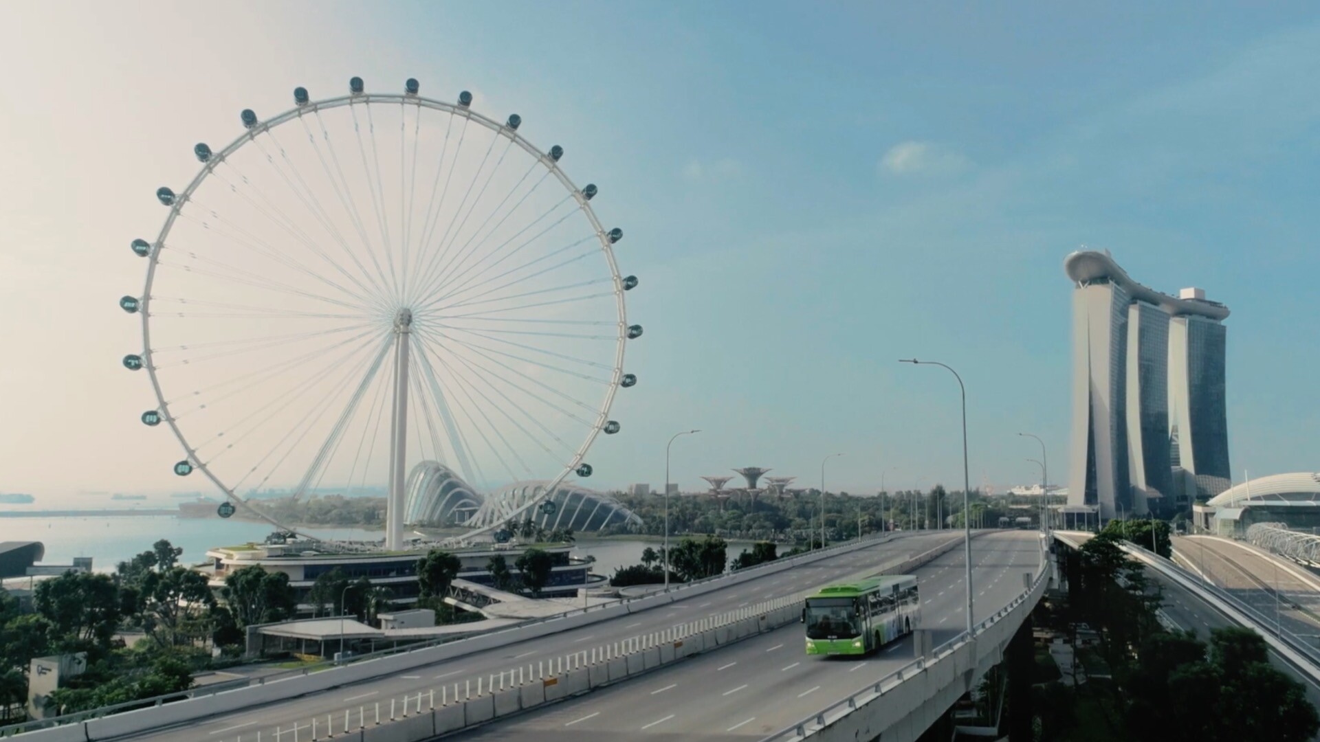 dreambox-advertising-communications Dreambox Studio Advertising Communications project, Bus over Skyline of Singapore